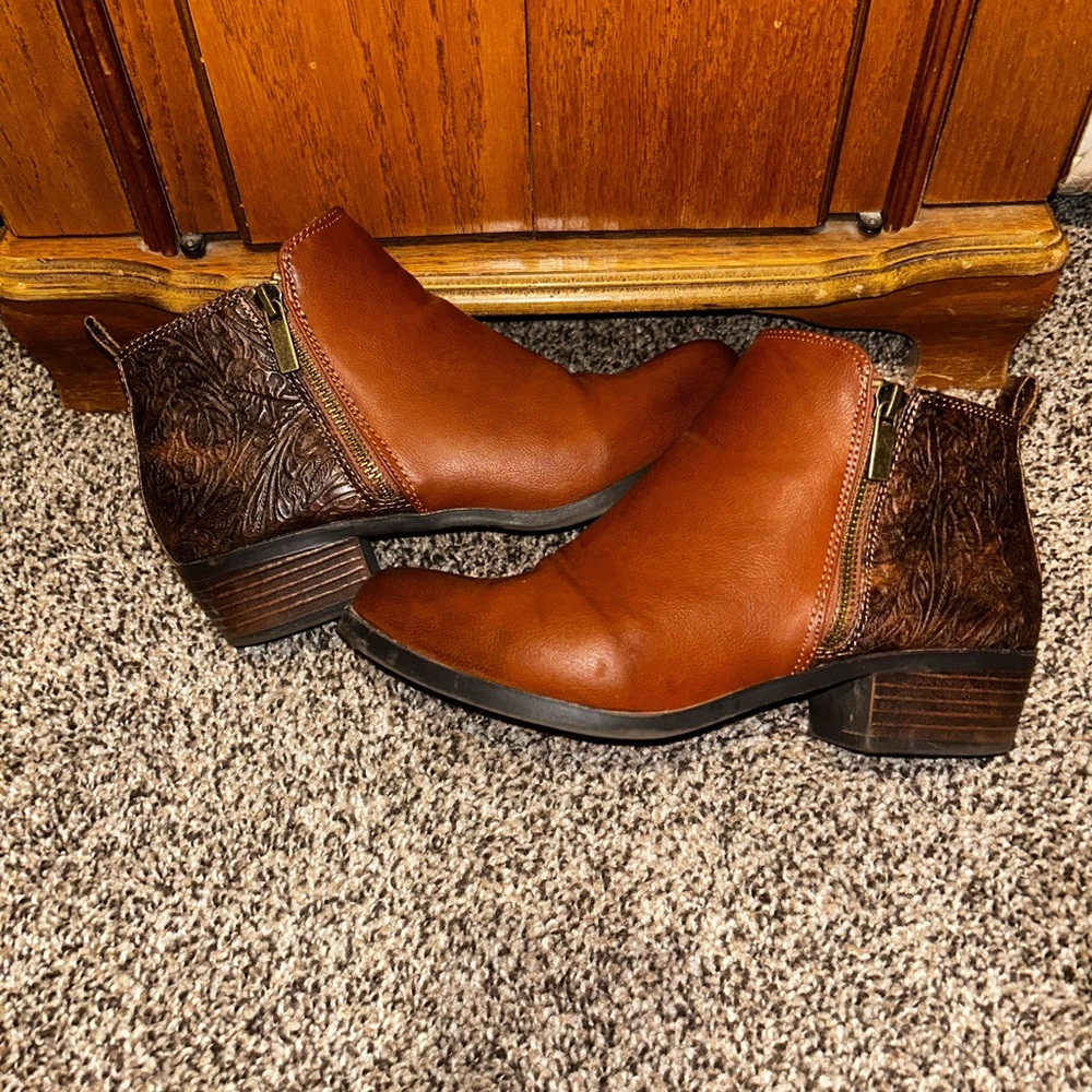 Brown booties with western looking tooled leather